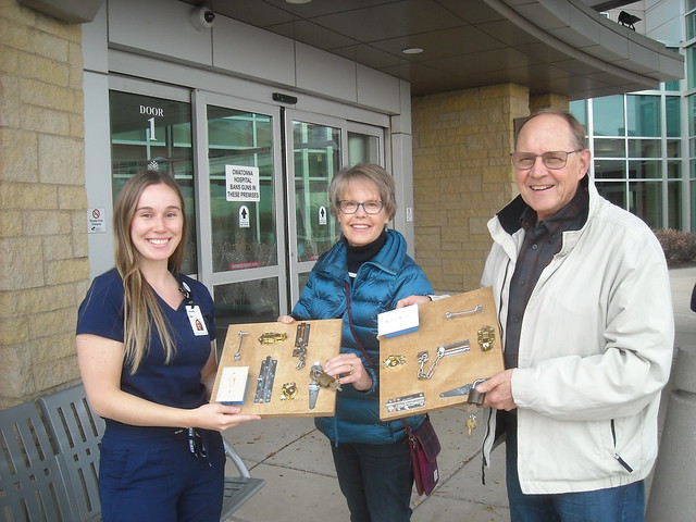 Melanie and Kirby Knutsen, center and right, present a pair of busy boards.