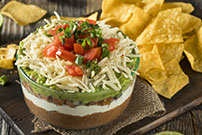 7 layer dip with tortilla chips 639873456