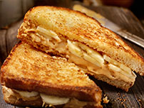 peanut butter and banana french toast slices on plate 518617714