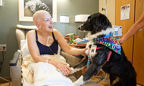 cancer patient with support dog