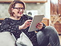 Woman using ipadthumbnail