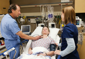 An ER nurse and doctor attend to a patient