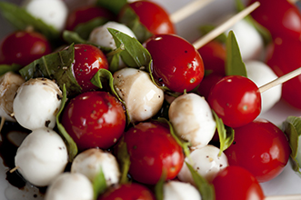 tomatoes and mozzarella balls on skewers