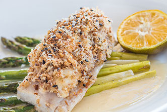 crusted cod filet over asparagus