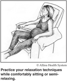 pregnant woman relaxing in a recliner