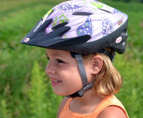 Girl wearing bike helmet