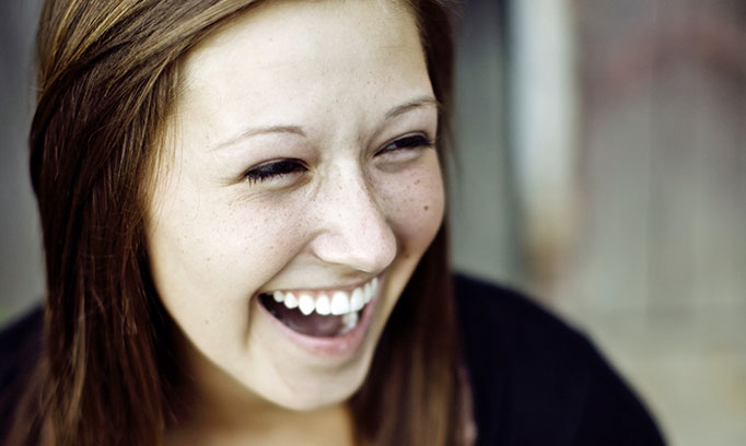 teen smiling for story about teens and stress