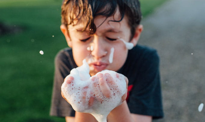 boy with bubbles 682x408