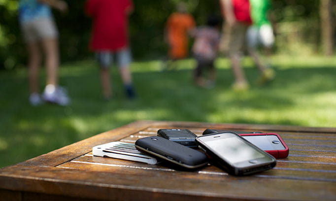 Kids set their phones down to play outside