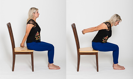 A woman demonstrating the seated chest opener pose
