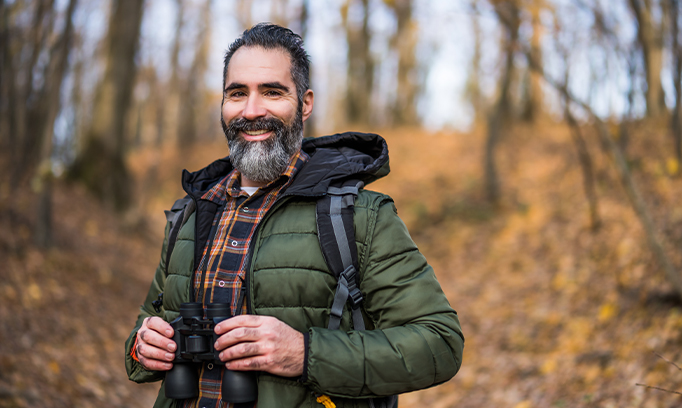 Couple discussing colon cancer screening while on a walk
