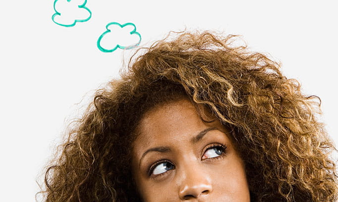 Woman pauses to question her self-talk