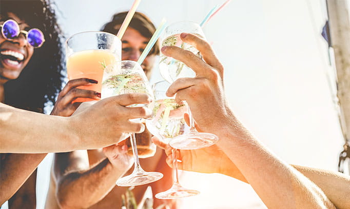 Millennials drinking alcoholic beverages. 