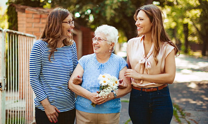 older woman with adult daughters 