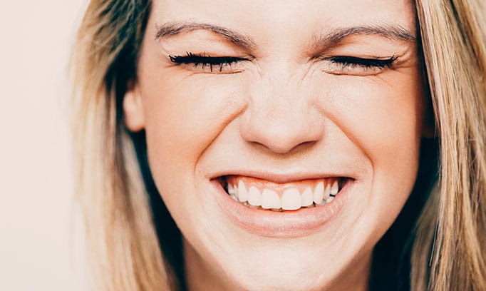 Girl shows teeth after oil pulling