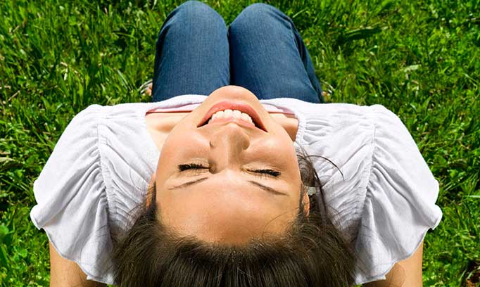 Woman relaxing on the grass