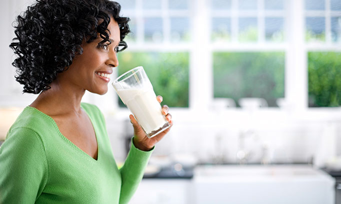 woman drinking vitamin d milk