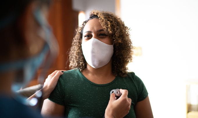 woman getting a heart checkup