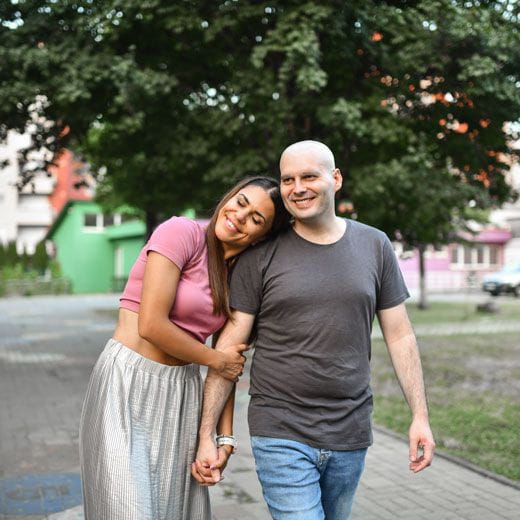 man walking with his wife after cancer diagnosis