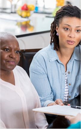 female with cancer and her support person