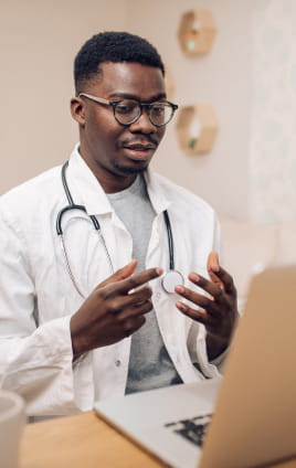 genetic counselor at computer