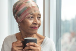 woman drinking coffee before chemo