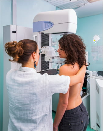 woman getting screened for breast cancer