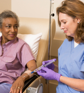 woman receiving COVID infusion treatment