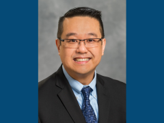 Dr Jim photo blue sides 240 x 180 px