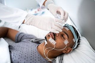 man undergoing sleep study