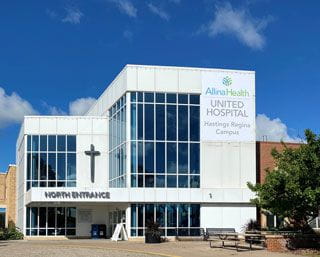 Regina campus with banner with new name 320x213