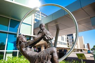 mother baby sculture outside mother baby center in coon rapids minnesota