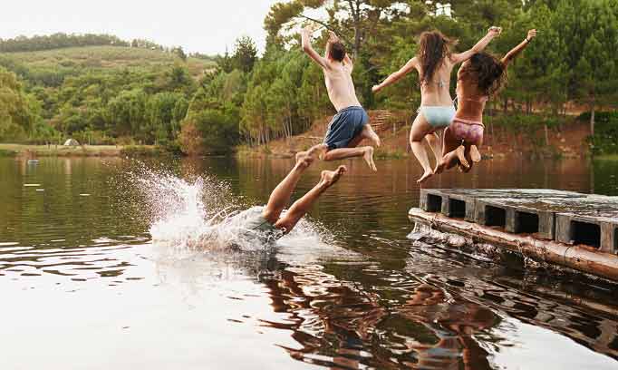 Four young adults may be in danger of a spinal cord injury as they ump off dock into lake during summer 682x408