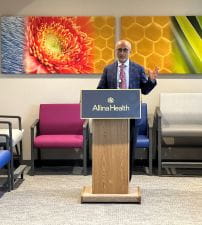 Konety speaking at Edina ribbon cutting 200x225