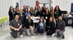 group of 17 employee volunteers at Lakevill event